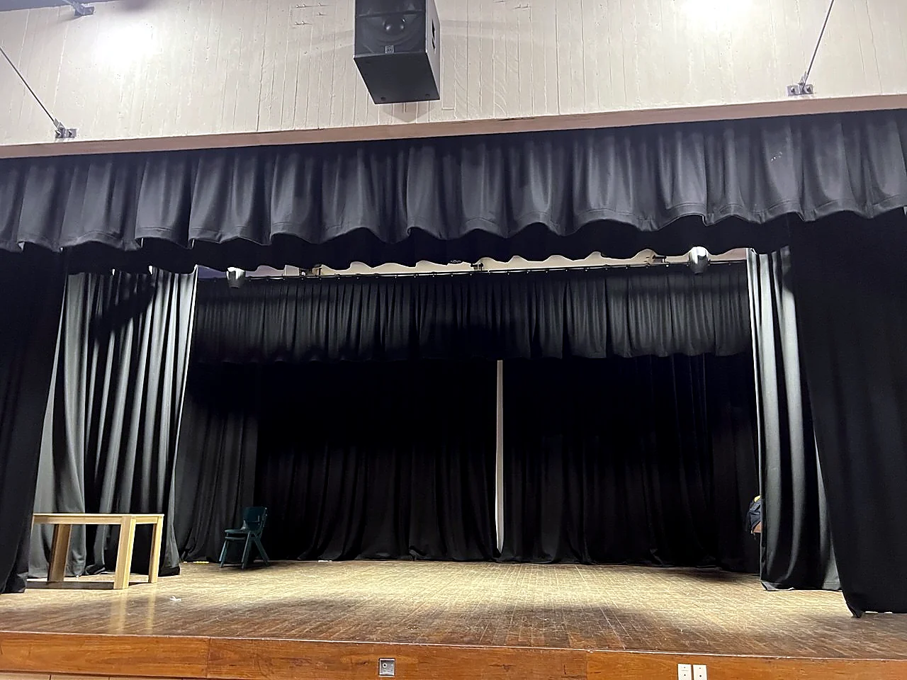 Stage with curtains in performance venue